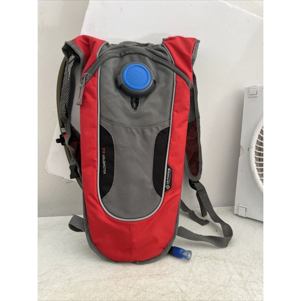 Outdoor Products Mist Hydration Trail Backpack Red White and Gray